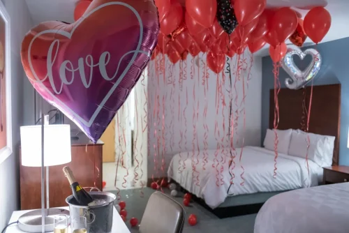 balloonshanging+from+the+ceiling+in+a+room+with+a+heart+balloon+that+says+love-1920w