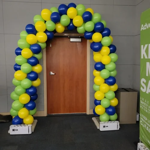 greenyellow+and+blue+balloon+arch+inside+in+front+of+a+doorway-1920w